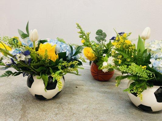 Florals in sports themed containers.