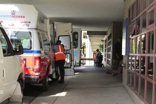 always a lot of vans dropping off and collecting people at the door to Rehab Hosp