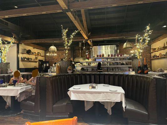 Main dining room with view of open kitchen