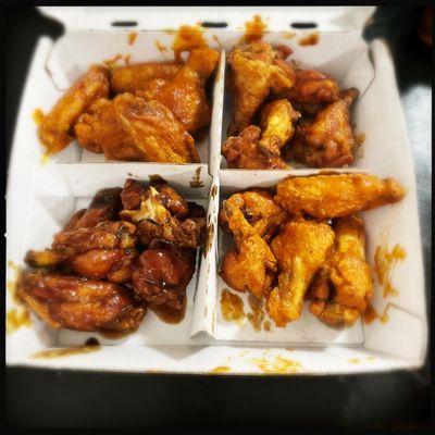 Blazin' Knockout, Golden Fire, parmesan garlic, and honey BBQ flavored wings