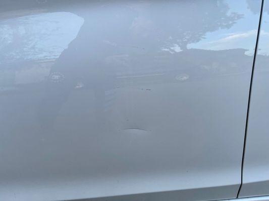 Before ( Driver Dent Close Up )