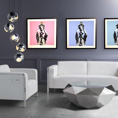 A series of paintings by Dot Dot Dot shown with our Thor Sofa and Gem Coffee Table.