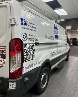 This image highlights the exceptional vehicle branding work produced by our team. The van is expertly wrapped with high-quality vinyl graphi