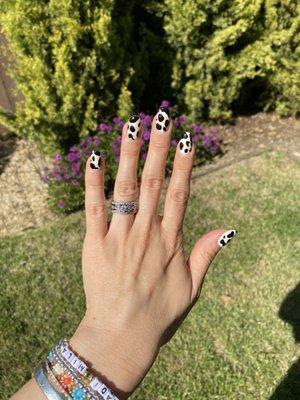 Cow design on gel manicure