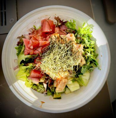 Salad with tuna and spicy salmon