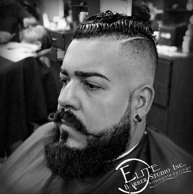 high skin fade with with combed over part & beard trim