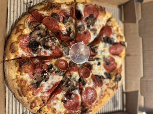 Pepperoni  and mushroom pizza