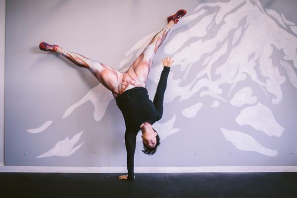 Single arm handstand