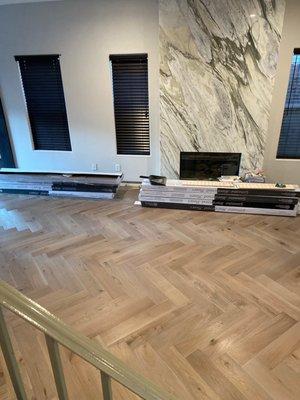 Beautiful herringbone flooring provided by Element.