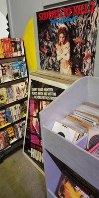 Small vinyl record and movie posters section