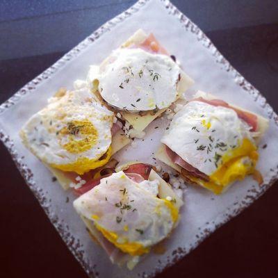 Sauteed kielbasa with mushrooms, onions topped with prosciutto, feta and an over easy egg on top of an everything bagel and mustard aioli.