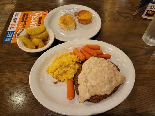 Chicken fried steak, with potato casserol, carrots, fried apples.