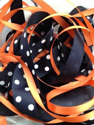 They have polka dot ribbons!!! :)