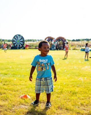 A kiddo enjoying all the inflatable rentals