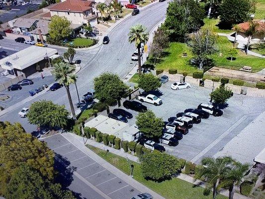 Irwindale police Rec camper parked on city property hooked up to city electric using extension cord to wall outlet.