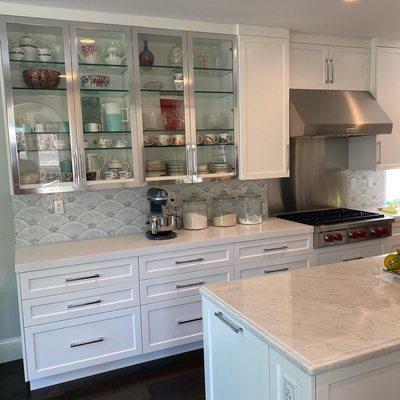 Kitchen cabinet with metal glass doors