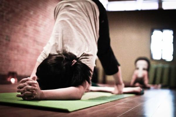 Stretching the shoulders in Dolphin pose