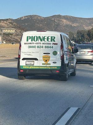 This truck threw a huge bag of garbage out their window on the side of the freeway. Terrible.