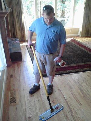 Wood floor cleaning and polishing