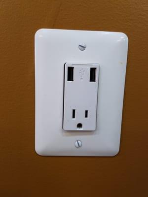 They have USB outlets, but you have to bring your own cord.