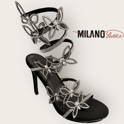 Flutter into style with these enchanting butterfly rhinestone heels from Milano Shoes!  Perfect for adding a whimsical touch to your look.