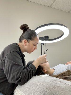 Owner doing a lash lift