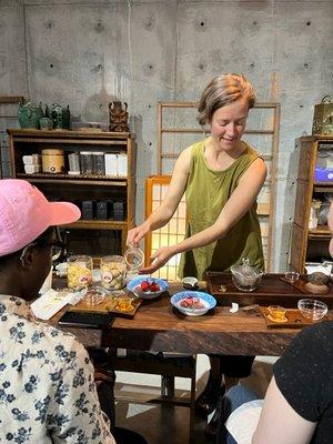 Zo Guthrie, Owner of Fox and Moon Tea hosting a tea tasting at the tea lounge.