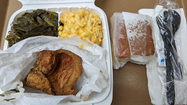 Pork chop with collard greens, mac & cheese, and cornbread