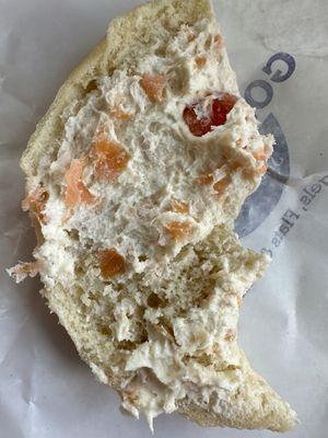 Goldberg bagel with the lightest amount of Lox Spread. Some of the bagel doesn't have any spread!