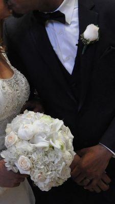 Snap of my all white bouquet & his boutonnière. So pretty.