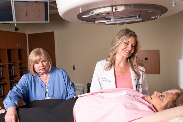 Patient getting set up for treatment with the LINAC (linear particle accelerator) at Radiotherapy Clinics of Georgia - Snellville.