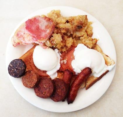 Irish Breakfast with home-fries, toast, fried tomato, 2 eggs, sausage, back bacon, black, red, and white pudding for $9.