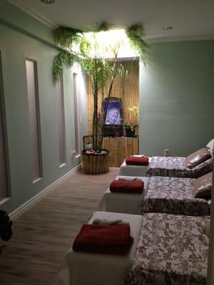 This is our most popular and tranquil room The Budda room. With a real live bamboo tree, sky light and water fall.