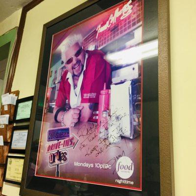 Guy Fieri signed poster from when he visited! Featured in a 2007 episode of "Diners, Drive-Ins and Dives"