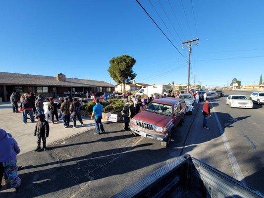 People lined up waiting for the sale to open.