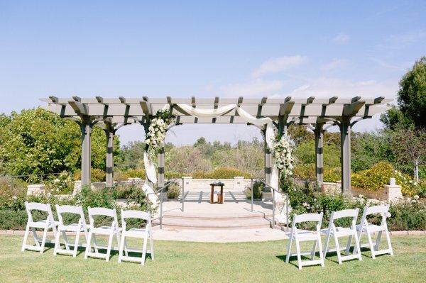 Wedding reception pergola florals and decor by Be Buds Florist