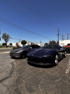 Ferrari Roma and Tesla Model 3