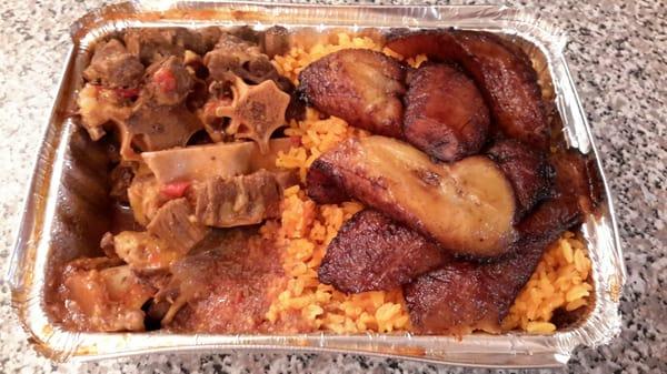 Ox tails,maduros, and yellow rice