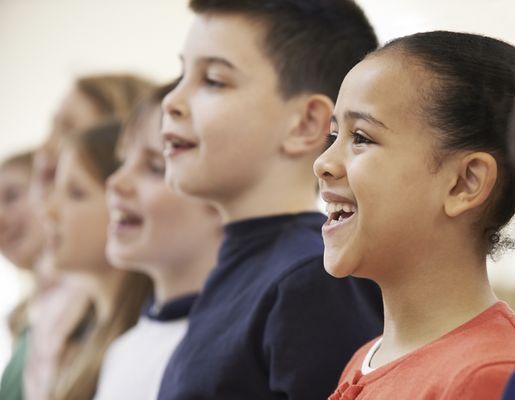 Our signature music curriculum includes a singing library and lessons to help school choirs learn proper vocal technique.