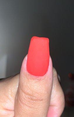 Cut cuticle with weird specs on nail