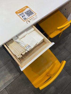 Drawers to hold extra utensils and napkins