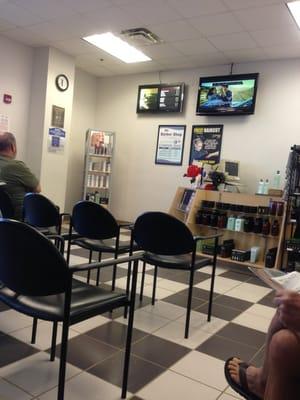 Waiting area has TV to keep you up to date on current events.