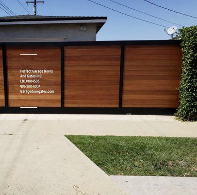 Custom Driveway Gate With Metal Frame And Horizontal Kayu Wood