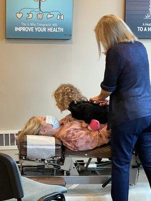 Toddler getting her first chiropractic check up and specific adjustment.