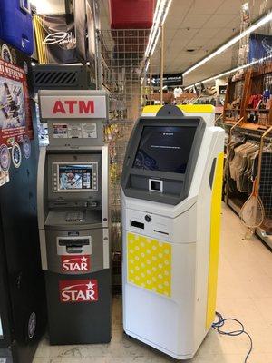 Bitcoin ATM and regular ATM at the store floor