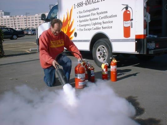 Servicing a fire extinguisher