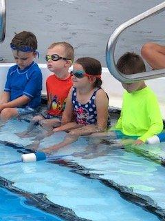 Stephen Lily and Benji waiting patiently for their 1st ever swim class.