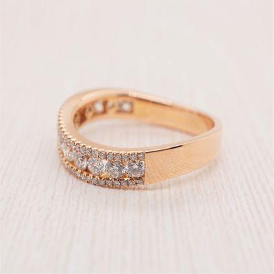 Simple rose gold wedding band with diamonds