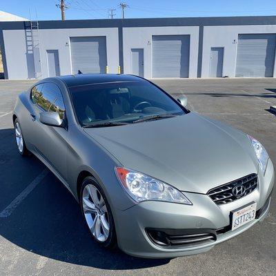 Hyundai Genesis after a color change vinyl wrap using Avery Dimension matte metallic Anthracite.