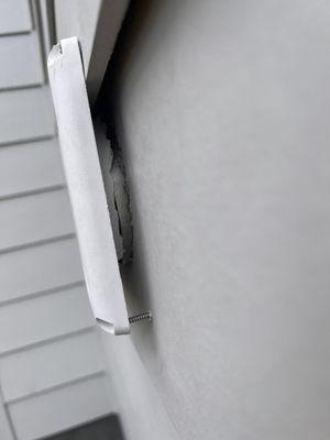 The vent outside was poorly cut and is not fully attached to the vent tube.